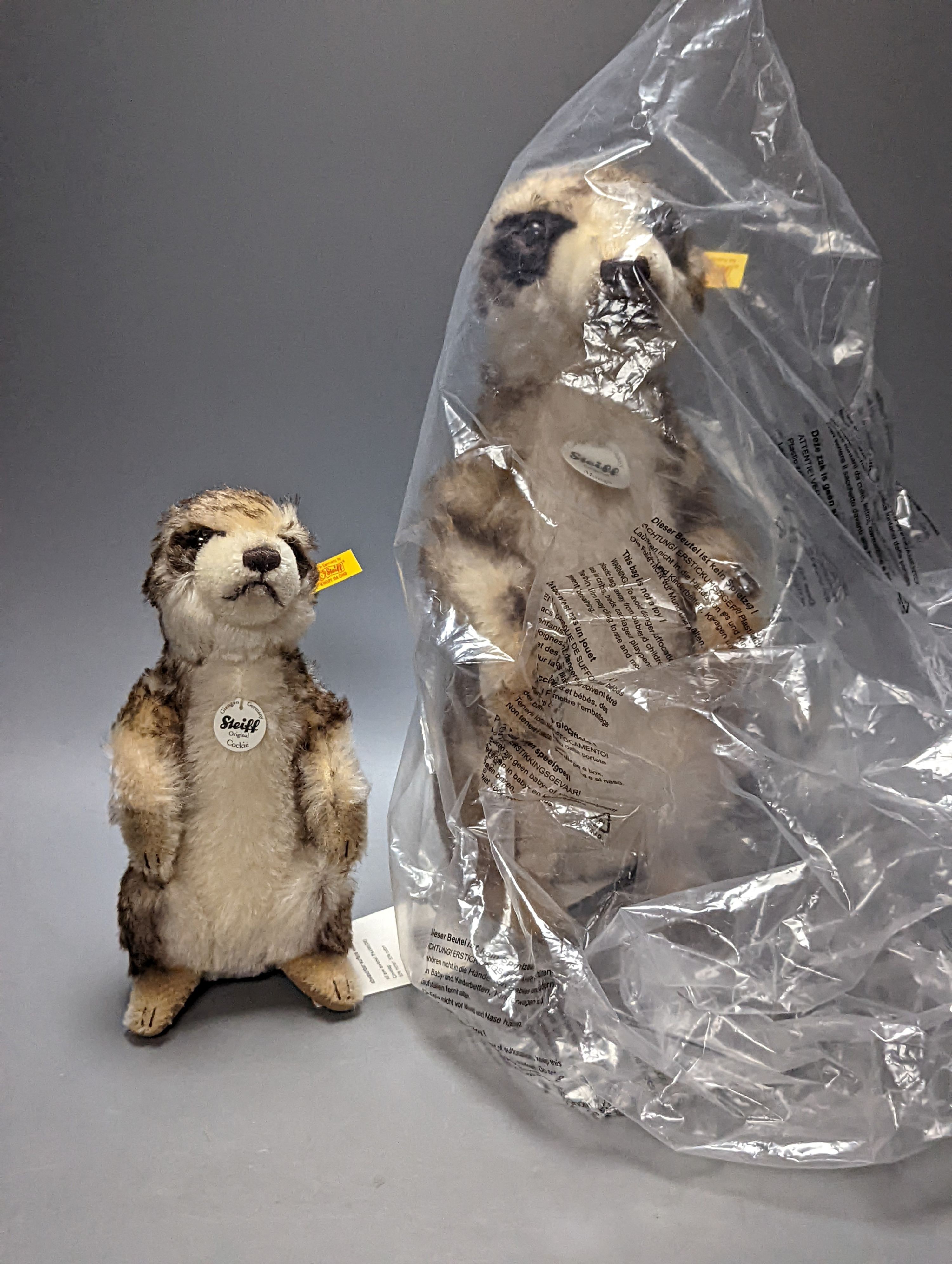 Two Danbury Mint Steiff Meercats, largest 30 cms high.